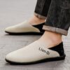 Newness Lian Di Mens Slip On Loafers in navy blue showcasing their breathable design and effortless style Perfect for any occasion