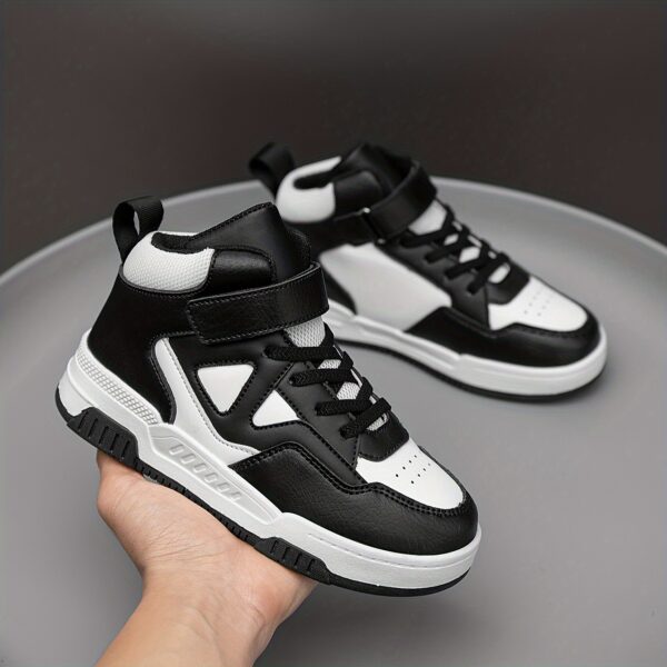 Stylish Retro Pixel Geometric Sneakers for kids by Newness. These sneakers feature a vibrant geometric pixel design.