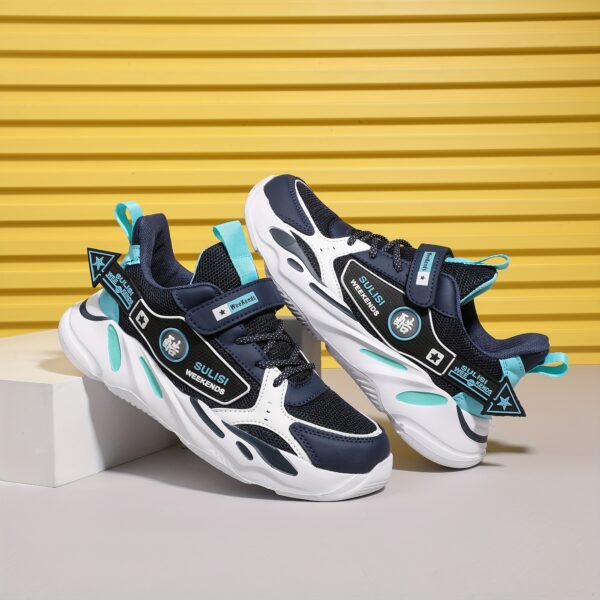 Stylish striped mesh youth sneakers, perfect for active kids. Breathable and comfortable design in a trendy color scheme.