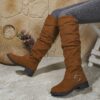 Newness Slouchy Knee High Boots in brown leather showcasing a chic and casual style perfect for winter The boots are slouchy and knee high highlighting their comfortable and fashionable design