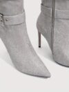 Newness Ascension Stiletto Buckle Boots Elevate your look with these stunning stiletto boots featuring a chic buckle detail