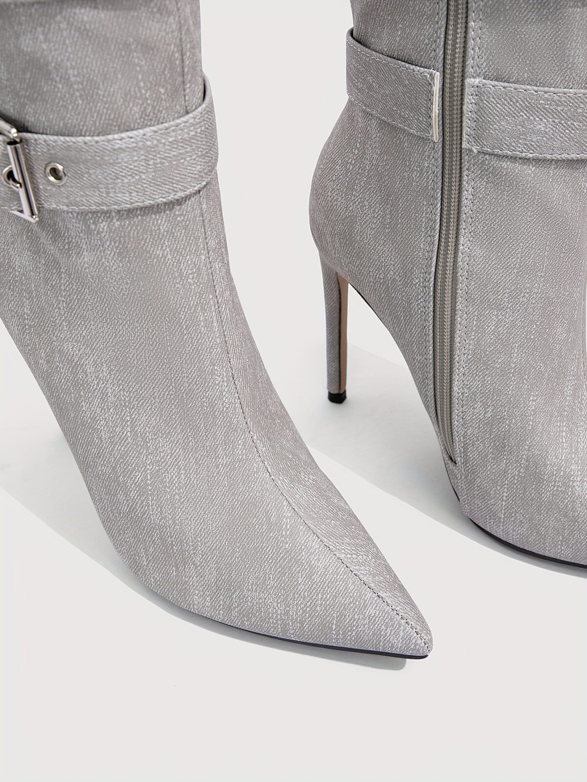 Newness Ascension Stiletto Buckle Boots Elevate your look with these stunning stiletto boots featuring a chic buckle detail