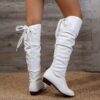 Newness Slouchy Bow Knee High Boots in brown leather Featuring a slouchy fit stylish bow detail and knee high shaft