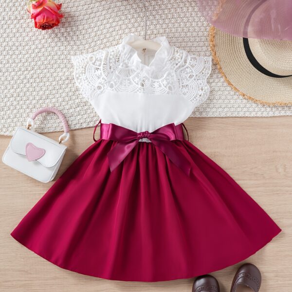 Adorable girl wearing a white Summer Bloom Lace Trim Dress, showcasing its delicate lace details and summery style.
