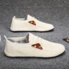 Light beige mens mesh slip on loafers with brown accents showcasing breathable mesh upper and durable rubber sole