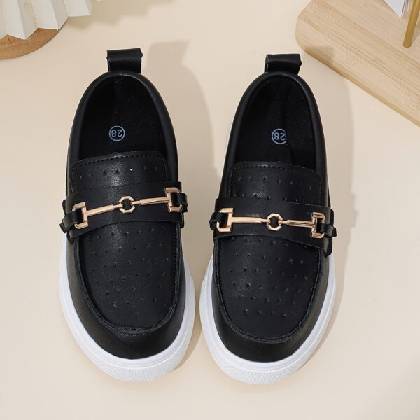 Stylish perforated boys loafers, perfect for any occasion. Comfortable and breathable design in a classic style.