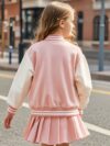 Lilac leopard heart varsity jacket and skirt set Stylish girls outfit featuring a lilac jacket with heart details and a leopard print skirt Perfect for fallwinter