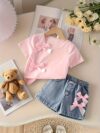 Adorable girls denim set with sweetheart neckline and bow detail perfect for playdates or school