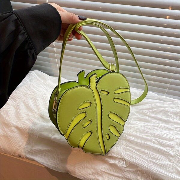 Newness Tropical Escape Leaf Crossbody Bag: A stylish and unique crossbody bag perfect for everyday use or outdoor adventures. Features a leaf-shaped design and adjustable strap.