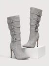 Newness Ascension Stiletto Buckle Boots Elevate your look with these stunning stiletto boots featuring a chic buckle detail