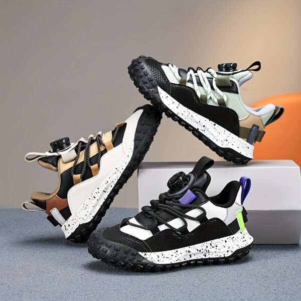 Stylish and comfortable Velocity Boys' Sneakers in multiple colors, perfect for any occasion. Showcasing the sneaker's design details and fit.