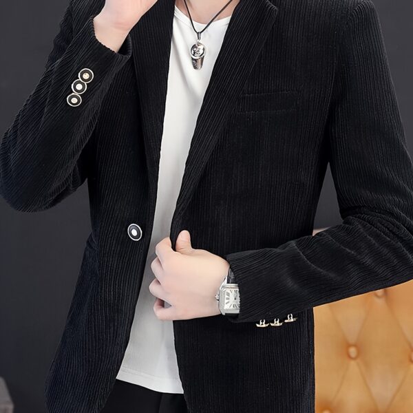 The Cairo Men's Corduroy Blazer in deep brown, a sophisticated and stylish men's blazer made from premium corduroy, perfect for any occasion. Model wearing the blazer.
