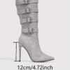 Newness Ascension Stiletto Buckle Boots Elevate your look with these stunning stiletto boots featuring a chic buckle detail