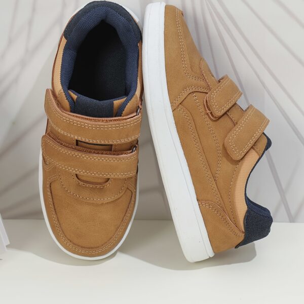 Stride Rite Boys' Sneakers from Newness: All-day comfort and style for active boys. Durable, stylish sneakers perfect for play and everyday wear.