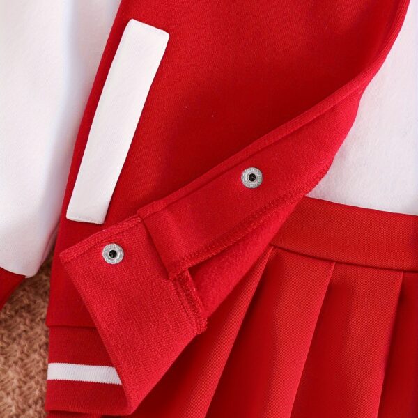 Stylish girls' preppy jacket set from Newness. Features a blazer and skirt combination in coordinating colors and fabrics. Perfect for school, special occasions, or everyday wear.