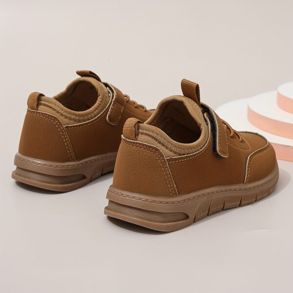 Stylish and comfortable boys' sneakers in Newness's latest collection, perfect for everyday wear and playdates.