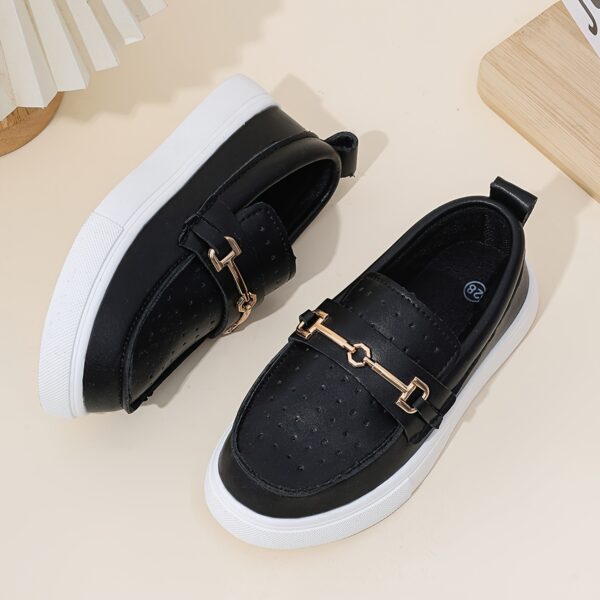 Stylish perforated boys loafers, perfect for any occasion. Comfortable and breathable design in a classic style.