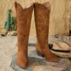 Stylish embroidered cowboy boots from Newness perfect for adding a touch of western flair to any outfit
