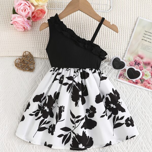Adorable girl wearing a vibrant Summer Bloom floral print dress, perfect for summer vacations.