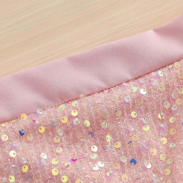 Adorable girls' summer outfit! Newness's Summer Sparkle two-piece set features a stylish top and coordinating bottom, perfect for parties, weddings, or any special occasion.
