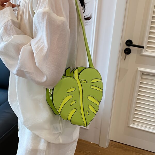 Newness Tropical Escape Leaf Crossbody Bag: A stylish and unique crossbody bag perfect for everyday use or outdoor adventures. Features a leaf-shaped design and adjustable strap.