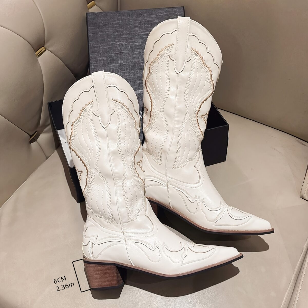 Stylish Embroidered Western Cowboy Boots from Newness perfect for any season These boots feature intricate embroidery and a classic silhouette
