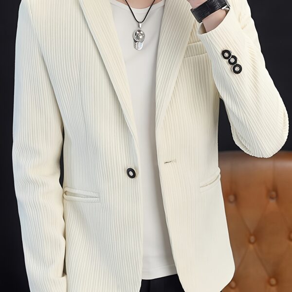 The Cairo Men's Corduroy Blazer in deep brown, a sophisticated and stylish men's blazer made from premium corduroy, perfect for any occasion. Model wearing the blazer.