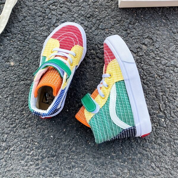 Newness Rainbow Retro Canvas Sneakers: Stylish and comfortable kids' sneakers, perfect for spring and fall. Lightweight and breathable canvas design in a vibrant rainbow color scheme.