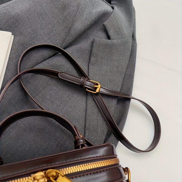 The Newness Riviera Vintage Boxy Tote, a chic and stylish boxy handbag perfect for any occasion. View the bag's structured shape, vintage-inspired details, and high-quality materials.