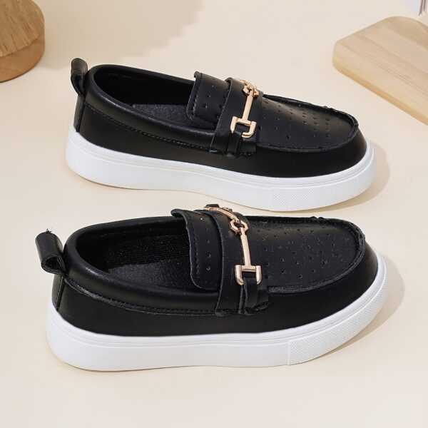 Stylish perforated boys loafers, perfect for any occasion. Comfortable and breathable design in a classic style.