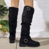 Newness Slouchy Knee High Boots in brown leather showcasing a chic and casual style perfect for winter The boots are slouchy and knee high highlighting their comfortable and fashionable design
