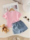 Adorable girls denim set with sweetheart neckline and bow detail perfect for playdates or school