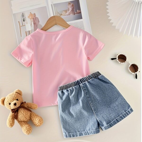 Adorable girls denim set with sweetheart neckline and bow detail, perfect for playdates or school.