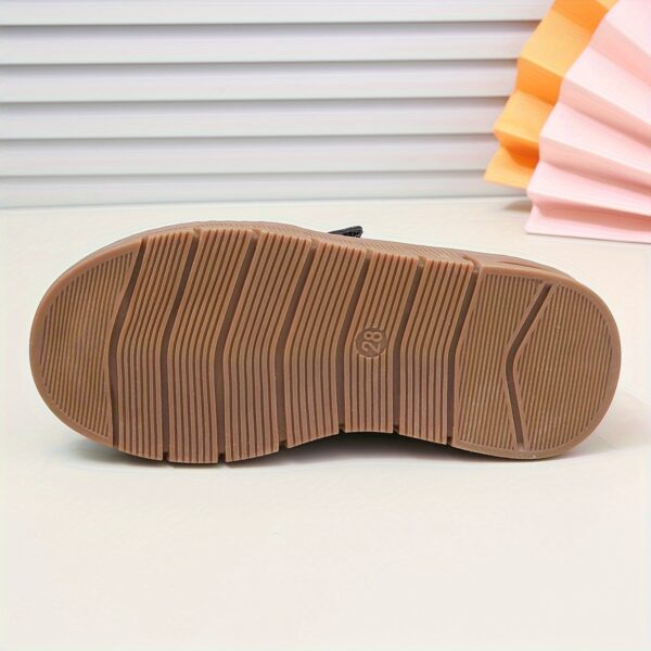 Stylish and comfortable boys' sneakers in Newness's latest collection, perfect for everyday wear and playdates.