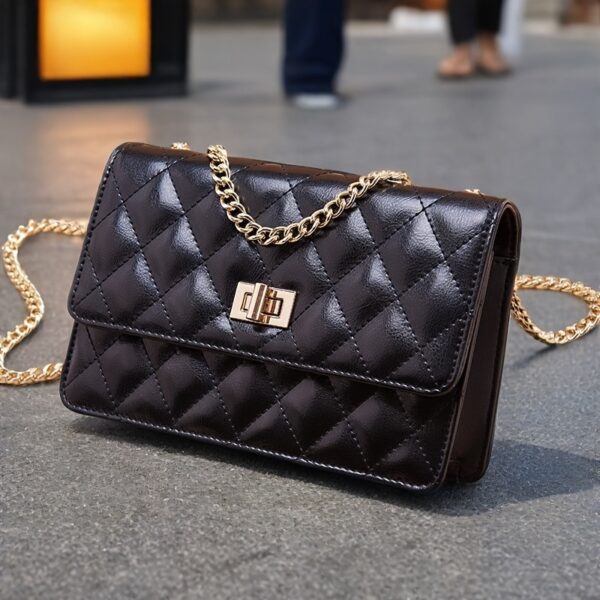 The Newness Riviera Quilted Leather Shoulder Bag in elegant detail; showcasing its chic design and quilted texture. Perfect for any occasion.