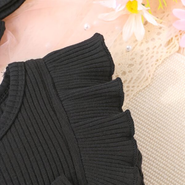 Petite Fleur: A charming girl in a floral mesh dress, twirling happily.