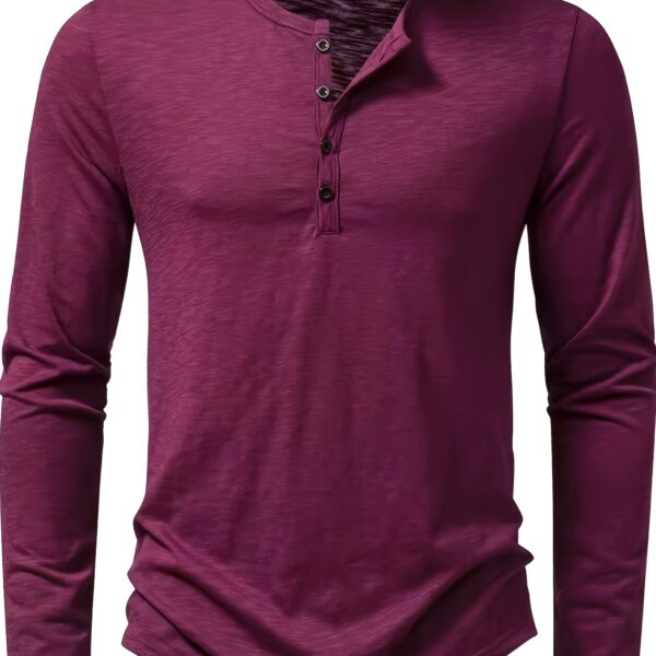 Close-up of a man wearing the Newness Essential Men's Cotton Henley shirt, showcasing its comfortable fit and premium cotton fabric. The model looks effortlessly stylish.