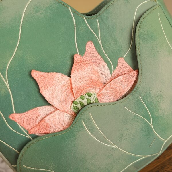 Newness Serene Lotus Embroidered Bag, showcasing exquisite floral embroidery, perfect for any occasion.