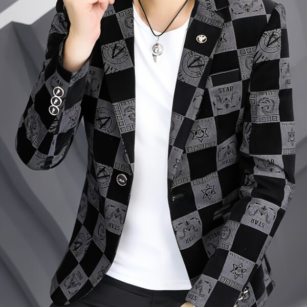Cairo Nights Men's Corduroy Blazer in deep navy blue, showcasing its corduroy texture and classic tailored fit. Model is wearing it with a crisp white shirt and dark jeans. Perfect for spring and fall.