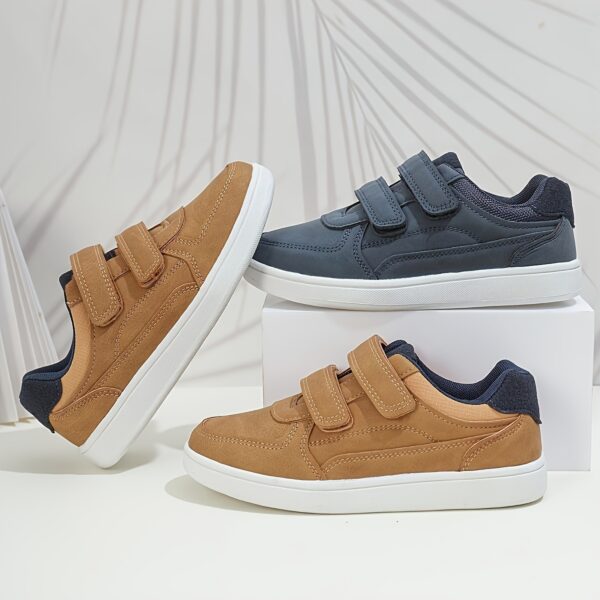 Stride Rite Boys' Sneakers from Newness: All-day comfort and style for active boys. Durable, stylish sneakers perfect for play and everyday wear.