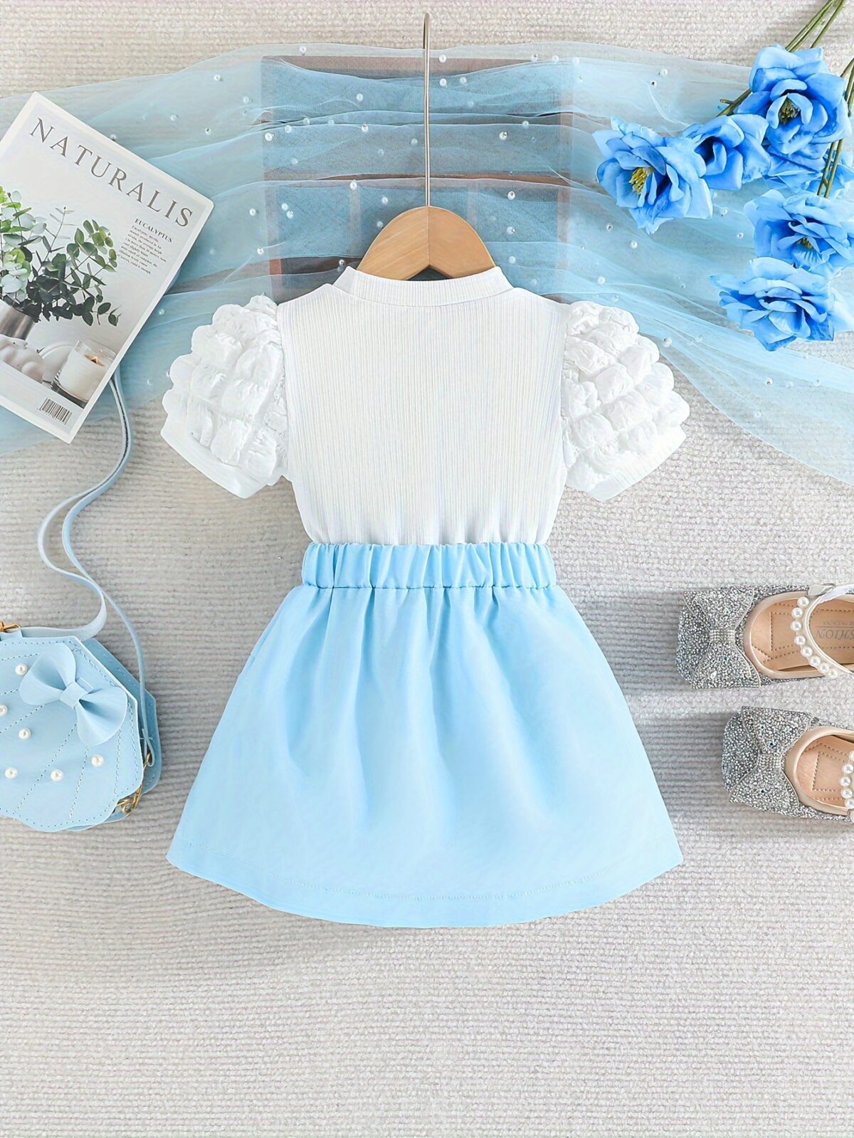 Adorable Pastel Dream Girls Summer Set featuring a pastel colored top and bottom perfect for summer The outfit is shown on a young girl highlighting its comfortable and stylish design