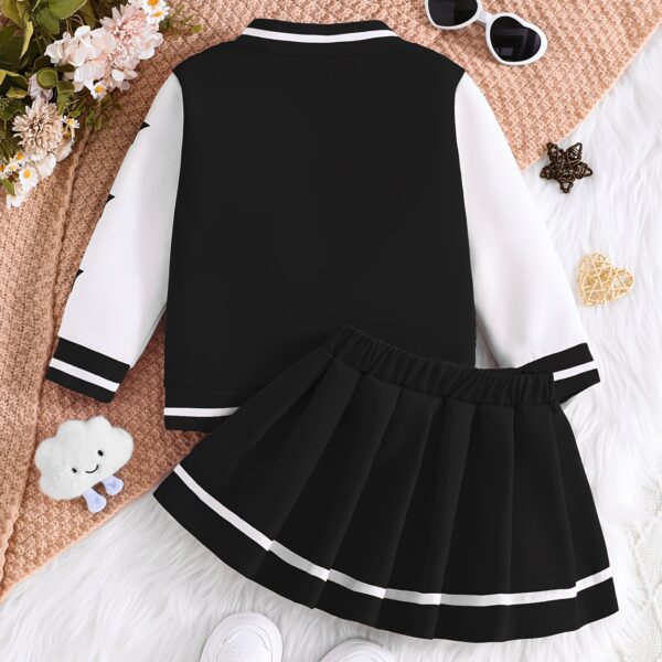 Stylish girls' preppy jacket set from Newness. Features a blazer and skirt combination in coordinating colors and fabrics. Perfect for school, special occasions, or everyday wear.