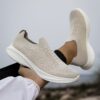 Newness Urban Trek Mens Slip On Sneakers in stylish minimalist design showcasing breathable comfort and effortless style