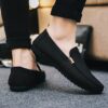 Newness Metropolitan Mens Slip On Loafers in classic black featuring breathable fabric a durable PU sole and stylish golden accents Perfect for everyday wear