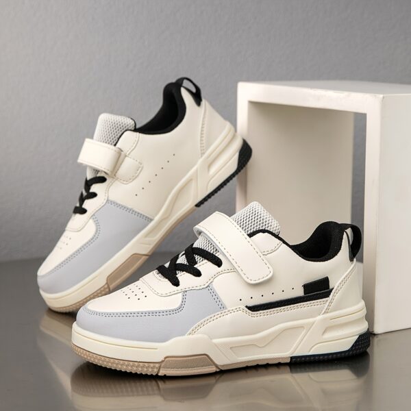 Stylish and comfortable patchwork sneakers for kids aged 14 and under. Newness Playful Steps design features a vibrant mix of colors and textures.