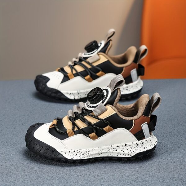 Stylish and comfortable Velocity Boys' Sneakers in multiple colors, perfect for any occasion. Showcasing the sneaker's design details and fit.