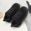 Stylish and comfortable black sneakers for kids perfect for everyday wear Newness Versatile Kids Black Sneakers