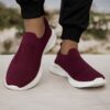 Newness Urban Trek Mens Slip On Sneakers in stylish minimalist design showcasing breathable comfort and effortless style