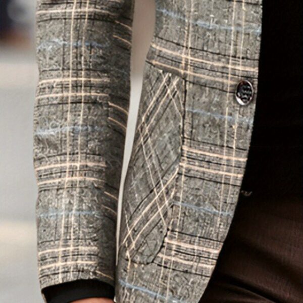The Newness Metropolitan Checkered Blazer in spring style. A close-up showcases the premium fabric and refined, modern look.