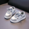 Stylish Starry Sky Boys Sneakers by Newness Trendy blue boys sneakers with a starry night design